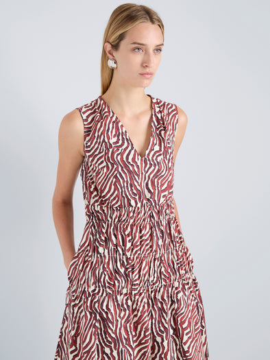 Proenza Schouler Detail image of model wearing Loren Dress in Poplin in Rust Cream Multi