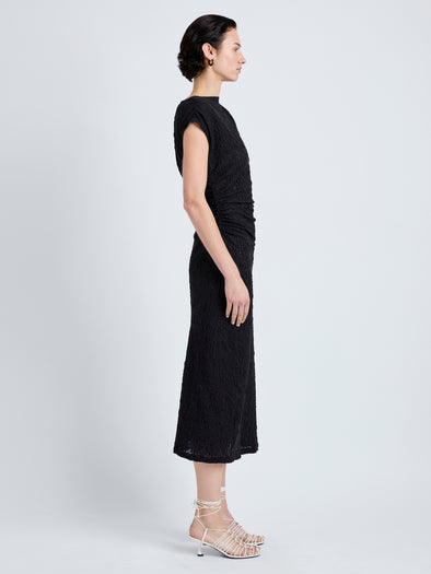Proenza Schouler Side full length image of model wearing Astra Dress in Stretch Lace in Black