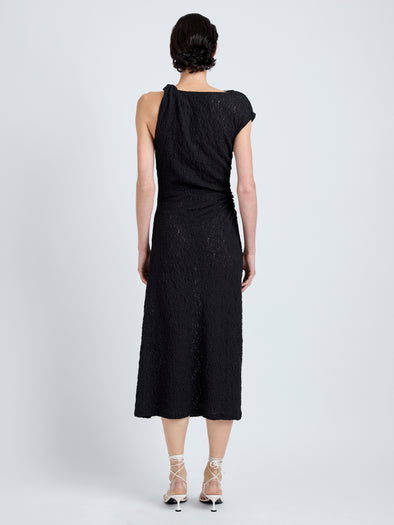 Proenza Schouler Back full length image of model wearing Astra Dress in Stretch Lace in Black