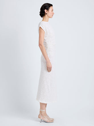Proenza Schouler Side full length image of model wearing Astra Dress in Stretch Lace in Alabaster