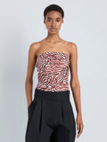 Proenza Schouler Front cropped image of model wearing Maisy Strapless Top in Poplin in Rust Cream Multi