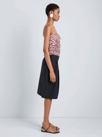 Proenza Schouler Side full length image of model wearing Maisy Strapless Top in Poplin in Rust Cream Multi