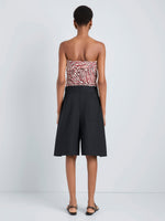 Proenza Schouler Back full length image of model wearing Maisy Strapless Top in Poplin in Rust Cream Multi