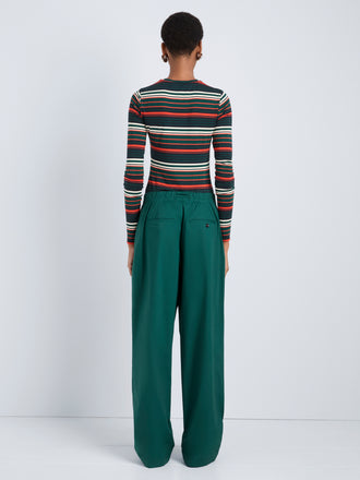 Proenza Schouler Back full length image of model wearing Mae Top in Striped Jersey in Spruce Multi