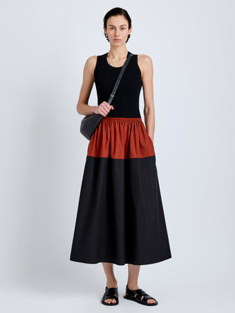 Proenza Schouler Front full length image of model wearing Nyla Skirt in Poplin in Brick Black