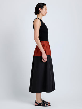 Proenza Schouler Side full length image of model wearing Nyla Skirt in Poplin in Brick Black