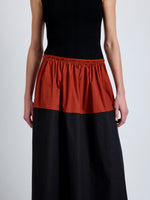 Proenza Schouler Detail image of model wearing Nyla Skirt in Poplin in Brick Black
