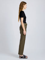 Proenza Schouler Side full length image of model wearing Isadora Pant in Leather in Fatigue