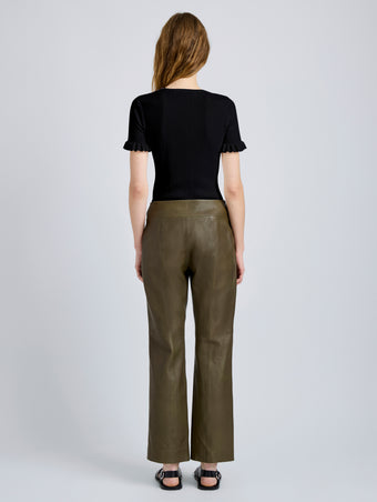 Proenza Schouler Back full length image of model wearing Isadora Pant in Leather in Fatigue