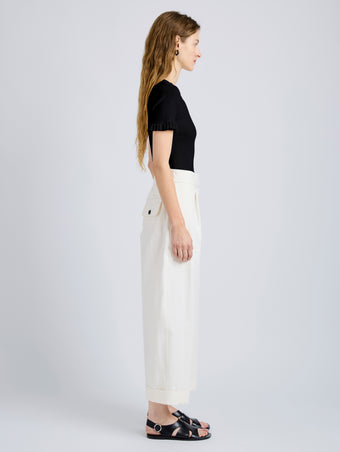 Proenza Schouler Side full length image of model wearing Talla Pant in Washed Cotton in Alabaster