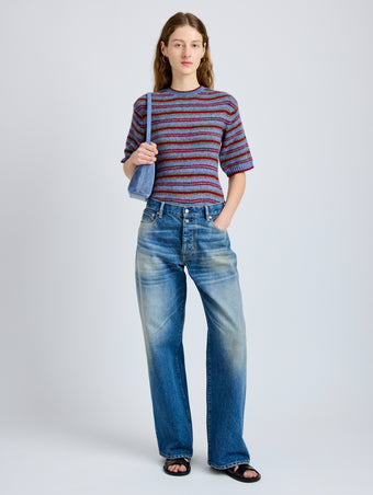 Proenza Schouler Front full length image of model wearing Dana Sweater in Stripe Knit in Periwinkle Stripe