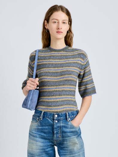 Proenza Schouler Front cropped image of model wearing Dana Sweater in Stripe Knit in Willow Stripe