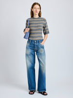 Proenza Schouler Front full length image of model wearing Dana Sweater in Stripe Knit in Willow Stripe