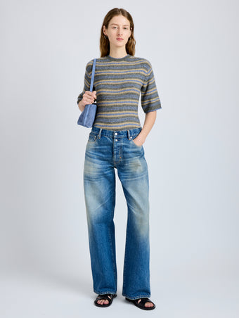 Proenza Schouler Front full length image of model wearing Dana Sweater in Stripe Knit in Willow Stripe