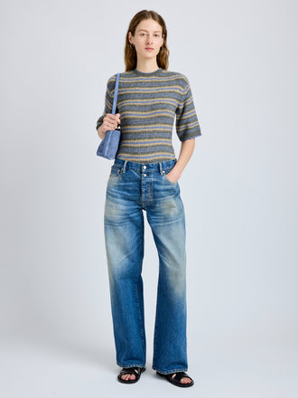 Proenza Schouler Front full length image of model wearing Dana Sweater in Stripe Knit in Willow Stripe