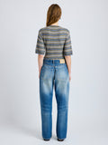 Proenza Schouler Back full length image of model wearing Dana Sweater in Stripe Knit in Willow Stripe