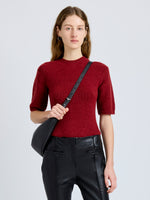 Proenza Schouler Front cropped image of model wearing Dana Sweater in Stripe Knit in Brick