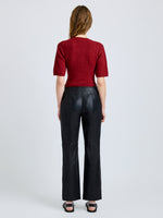Proenza Schouler Back full length image of model wearing Dana Sweater in Stripe Knit in Brick