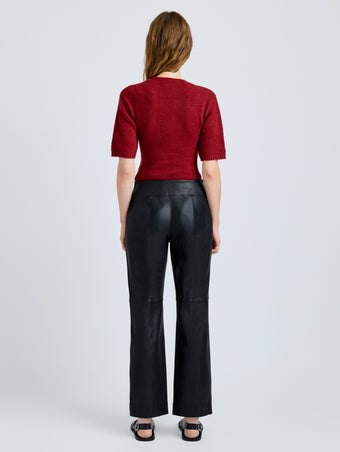 Proenza Schouler Back full length image of model wearing Dana Sweater in Stripe Knit in Brick