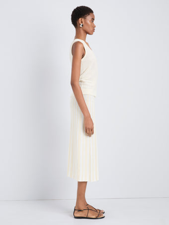 Proenza Schouler Side full length image of model wearing Isley Skirt in Cotton Rib in Butter White