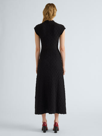 Proenza Schouler Back full length image of model wearing Cleo Dress in Jersey Jacquard in Black