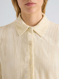 Proenza Schouler Detail image of model wearing Madi Top in Crushed Velvet in Pale Lemon
