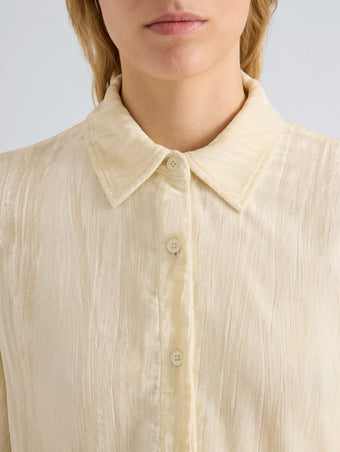 Proenza Schouler Detail image of model wearing Madi Top in Crushed Velvet in Pale Lemon