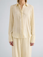 Proenza Schouler Detail image of model wearing Madi Top in Crushed Velvet in Pale Lemon