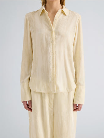 Proenza Schouler Detail image of model wearing Madi Top in Crushed Velvet in Pale Lemon