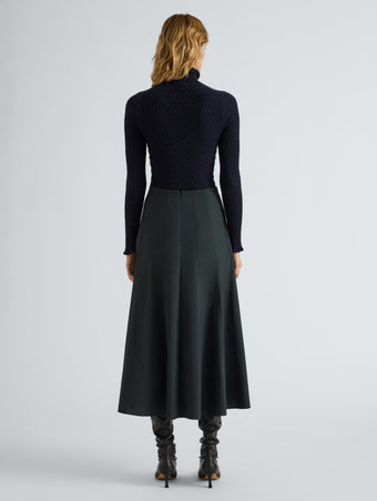Proenza Schouler Back full length image of model wearing Heidi Skirt in Stretch Cotton in Dark Green