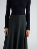 Proenza Schouler Detail image of model wearing Heidi Skirt in Stretch Cotton in Dark Green