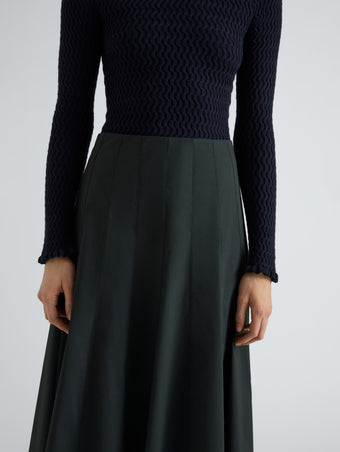 Proenza Schouler Detail image of model wearing Heidi Skirt in Stretch Cotton in Dark Green