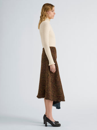 Proenza Schouler Side full length image of model wearing Layne Skirt in Tweed in Henna Multi