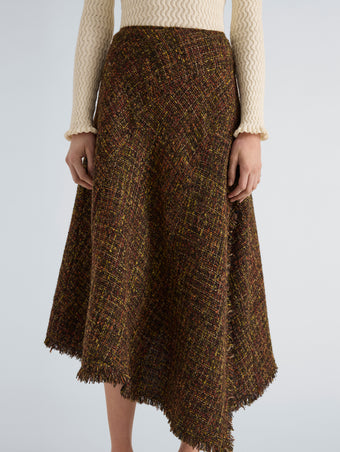 Proenza Schouler Detail image of model wearing Layne Skirt in Tweed in Henna Multi