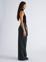 Proenza Schouler Side full length image of model wearing Raver Pant in Stretch Cotton in Dark Green