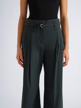 Proenza Schouler Detail image of model wearing Raver Pant in Stretch Cotton in Dark Green