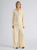 Proenza Schouler Front full length image of model wearing Meadow Pant in Crushed Velvet in Pale Yellow