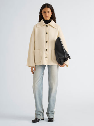 Proenza Schouler Front full length image of model wearing Nelly Jacket in Melange Merino in White