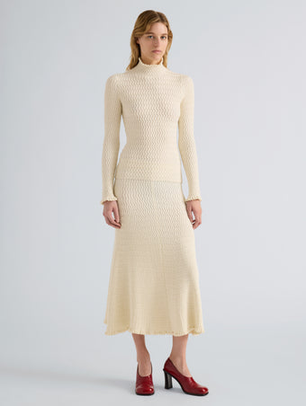 Proenza Schouler Front full length image of model wearing Juniper Sweater in Cable Knit in Vanilla