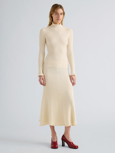 Proenza Schouler Front full length image of model wearing Juniper Sweater in Cable Knit in Vanilla