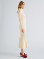 Proenza Schouler Side full length image of model wearing Juniper Sweater in Cable Knit in Vanilla