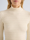 Proenza Schouler Detail image of model wearing Juniper Sweater in Cable Knit in Vanilla