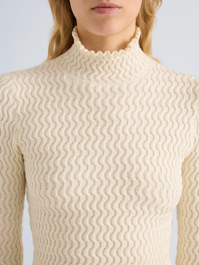Proenza Schouler Detail image of model wearing Juniper Sweater in Cable Knit in Vanilla