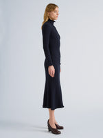 Proenza Schouler Side full length image of model wearing Juniper Sweater in Cable Knit in Navy