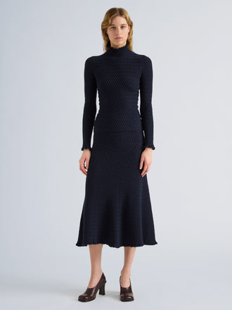 Proenza Schouler Front full length image of model wearing Lyra Top in LW Faux Leather in Oxblood
