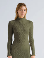 Proenza Schouler Front cropped image of model wearing Juniper Sweater in Cable Knit in Dark Olive
