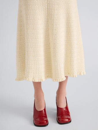 Proenza Schouler Detail image of model wearing Magnolia Skirt in Cable Knit in Vanilla
