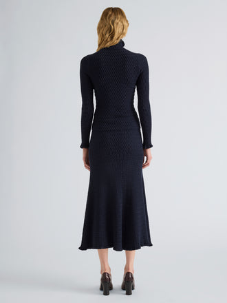Proenza Schouler Back full length image of model wearing Magnolia Skirt in Cable Knit in Navy