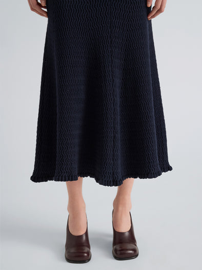 Proenza Schouler Detail image of model wearing Magnolia Skirt in Cable Knit in Navy