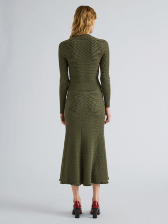 Proenza Schouler Back full length image of model wearing Magnolia Skirt in Cable Knit in Dark Olive